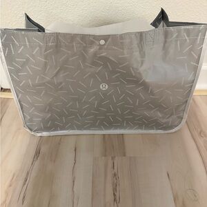 Jumbo lululemon athletica silver shopping bag Tote Bag